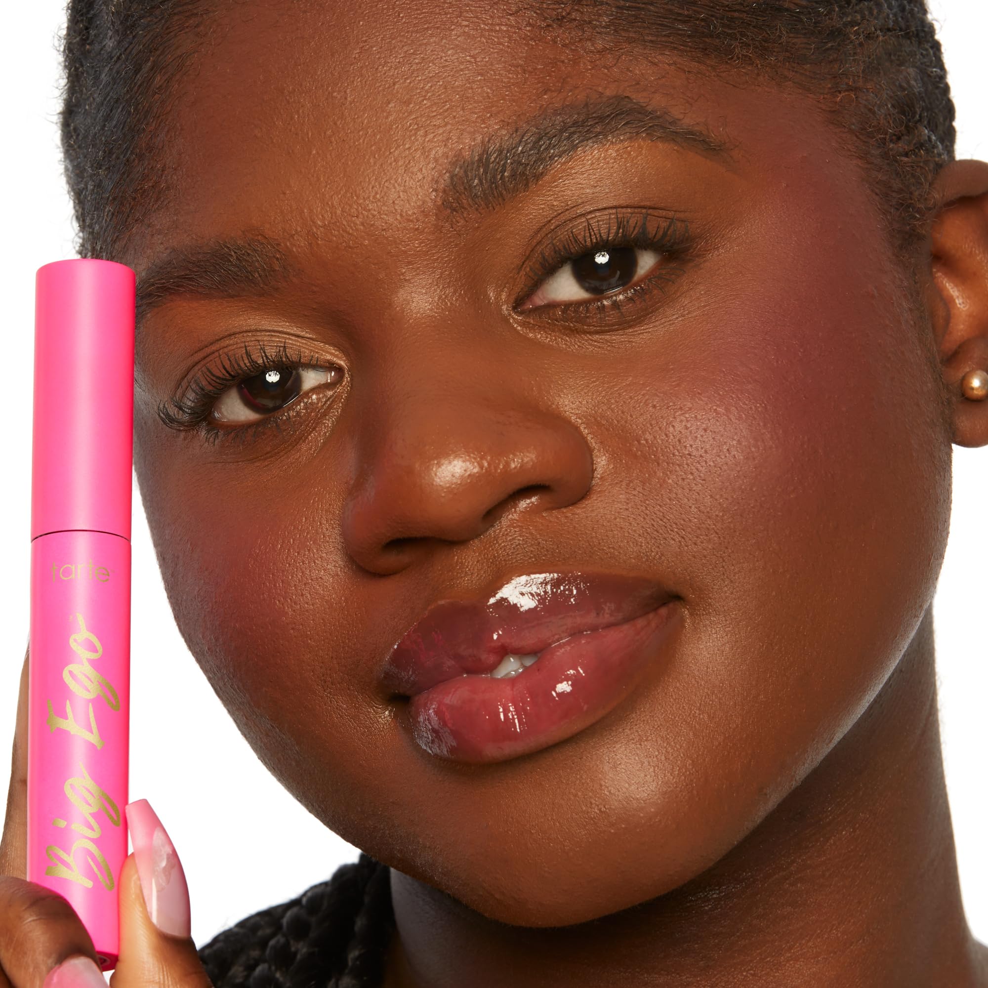 Full-size tube beside clean black design and cruelty-free badge