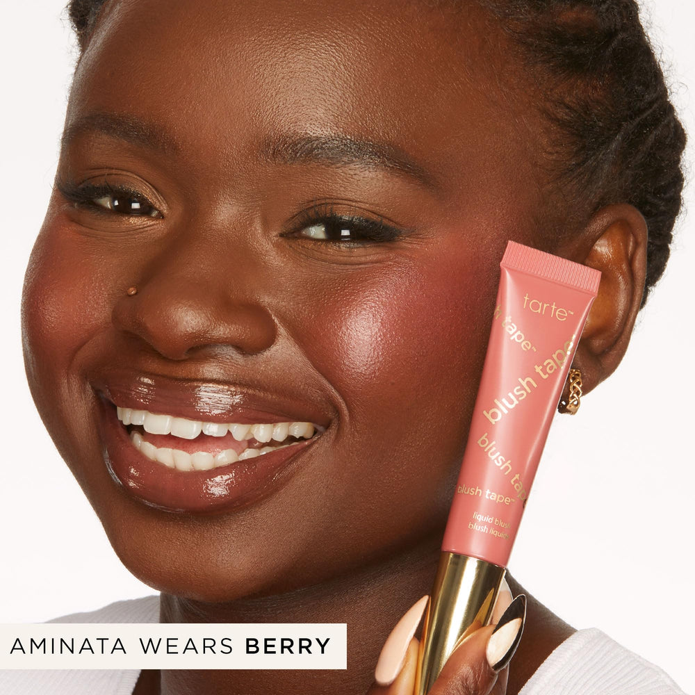 tarte blush tape berry buildable-coverage shows versatile color depth on skin.
