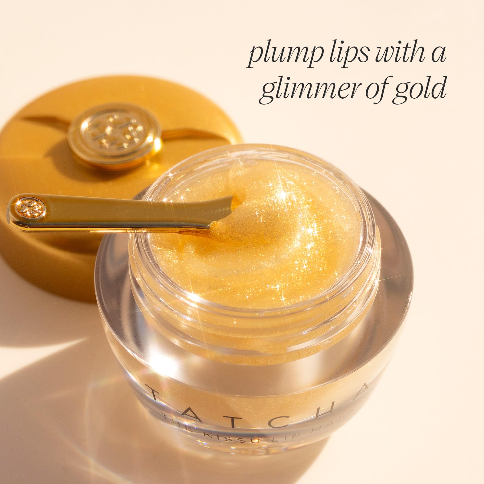 TATCHA Kissu Gold Leaf Lip Mask jar open with gold shimmer and moisture