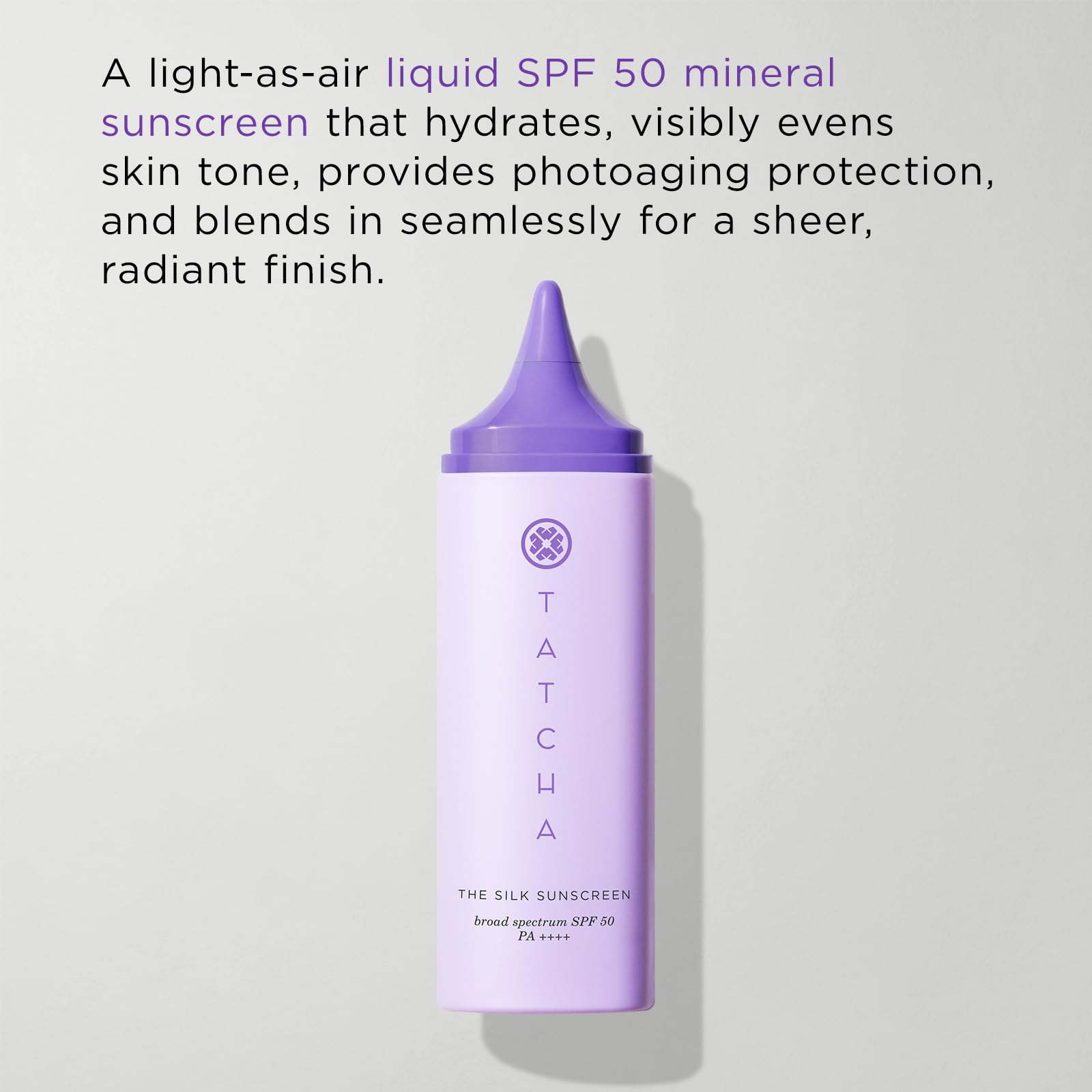 TATCHA Silk Sunscreen texture swirl highlights the creamy mineral formula for easy blending.