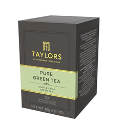Individually wrapped green tea bags and packaging showing freshness