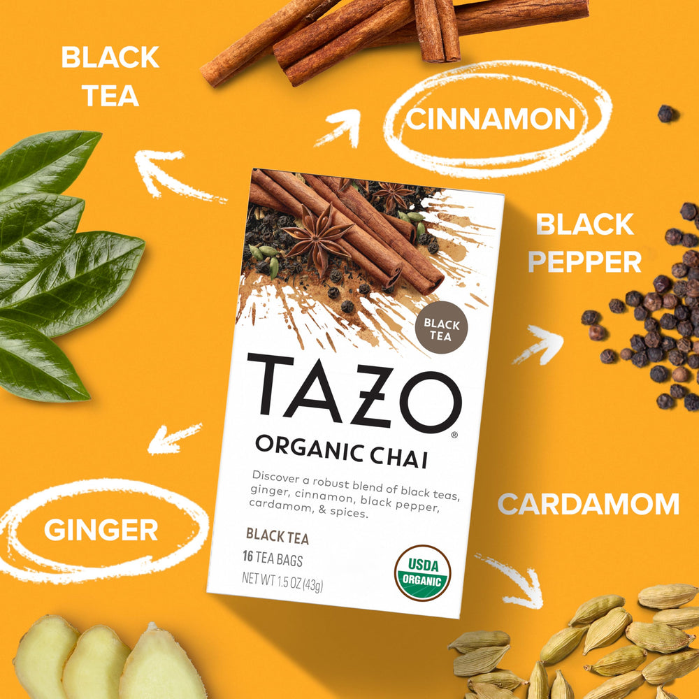 Hot water steeping a TAZO chai tea bag for a cozy cup.