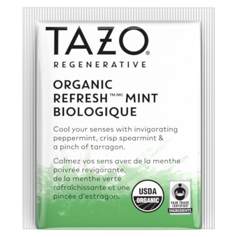 Hot water pours over TAZO Refresh Mint tea bag, releasing flavor.
