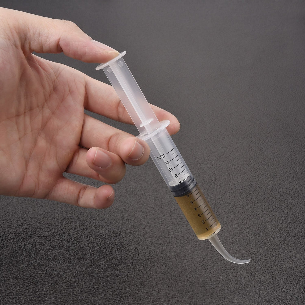 TecUnite mouthwash irrigation syringe supports post-care cleansing and rinsing routines.