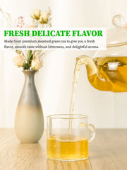 TeeLux decaf green tea bags close-up on label, emphasizing CO2 decaffeination preserves flavor.