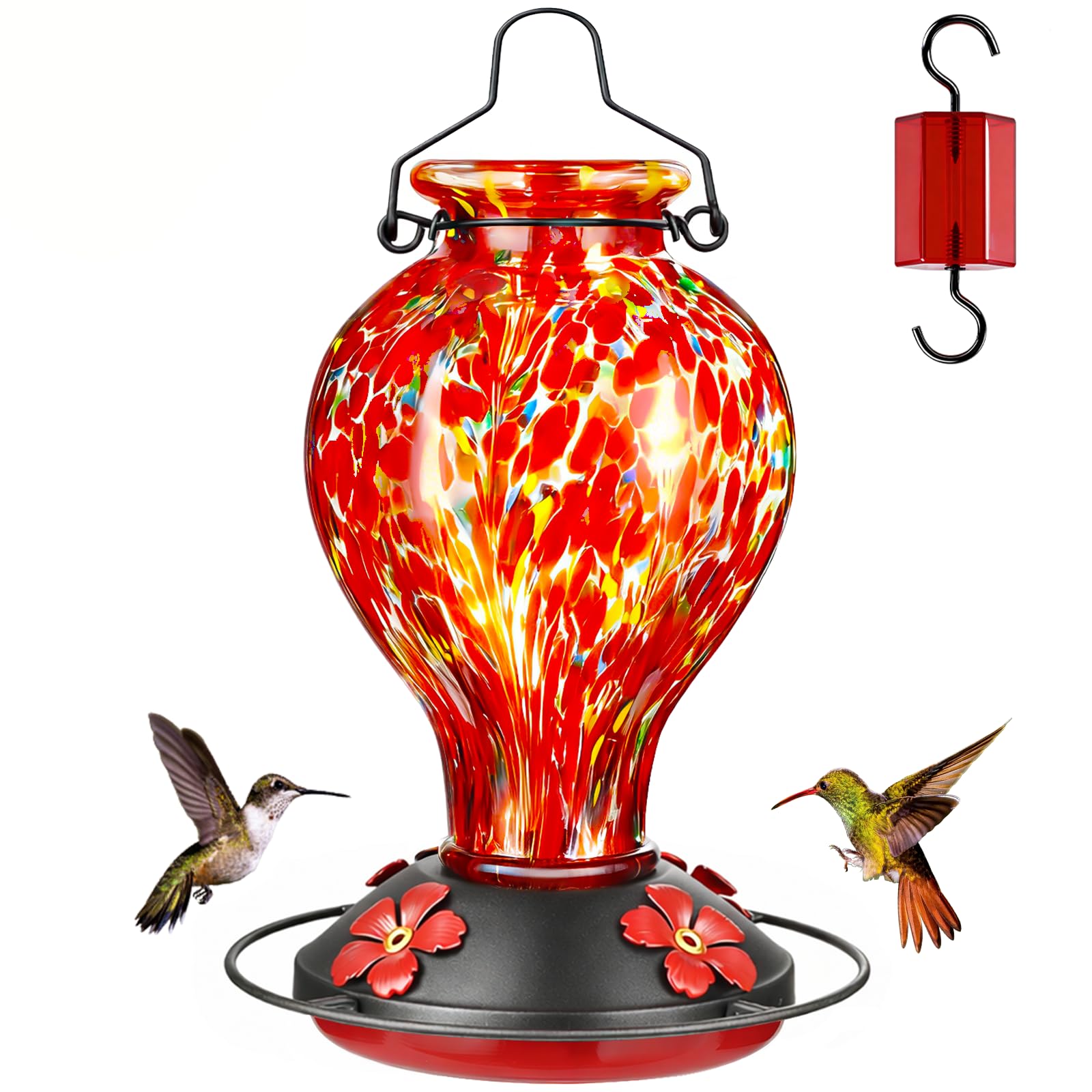 Tegarbed hummingbird feeder with red polka dots, attracting hummingbirds outdoors.