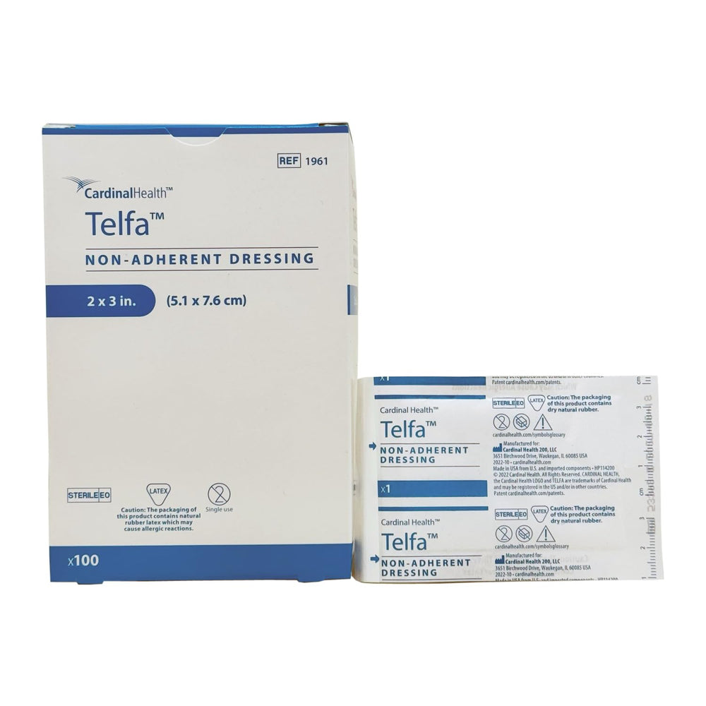 Telfa non-adherent dressing pad inside wrap for sterile presentation.
