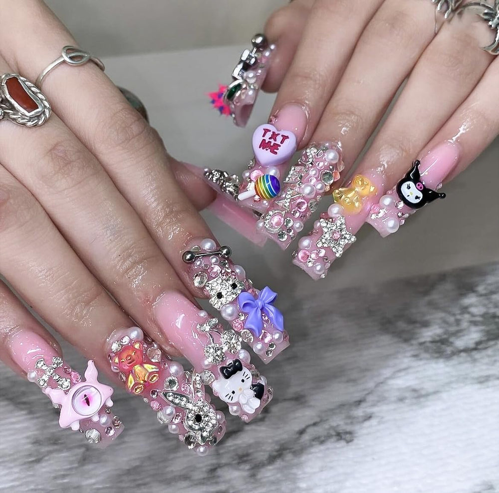 TemBelle kawaii cat charms kit enhances cute nail designs with silver rhinestones.