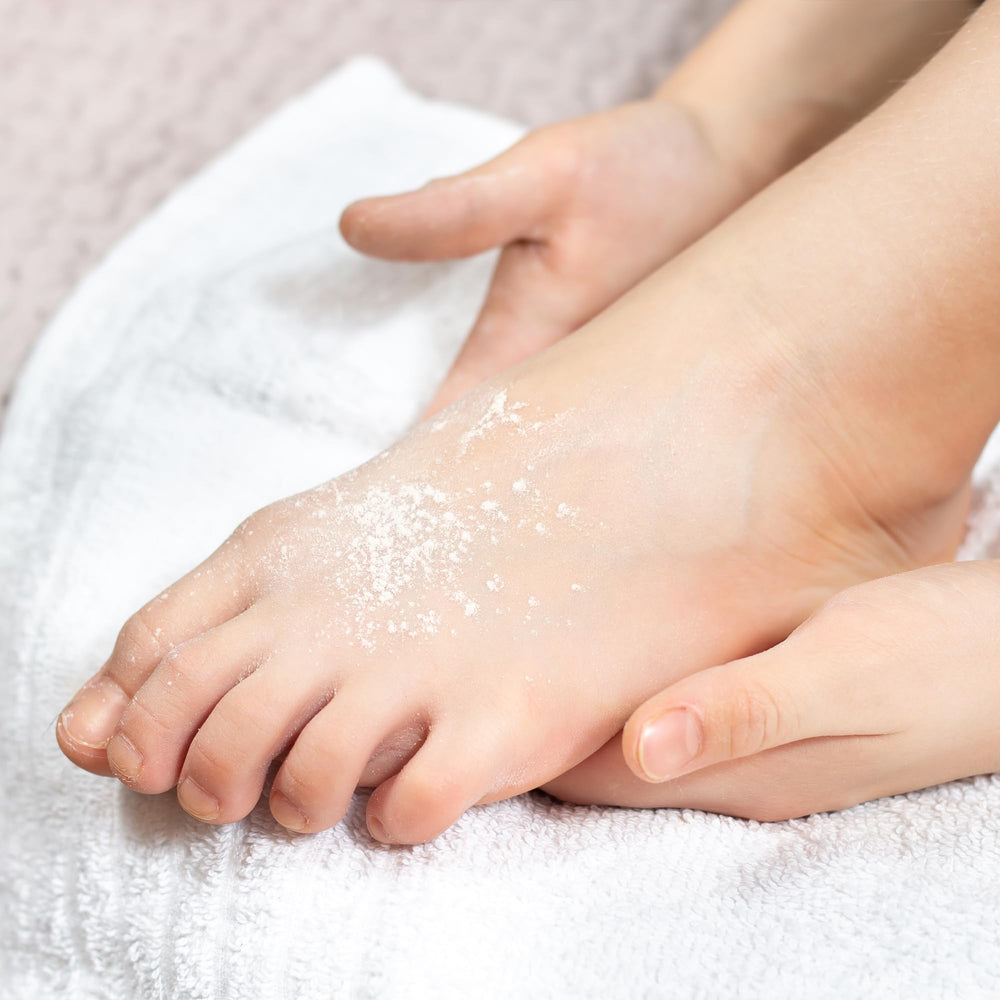 TenderGentle Miconazole Powder texture detail showing fine consistency.