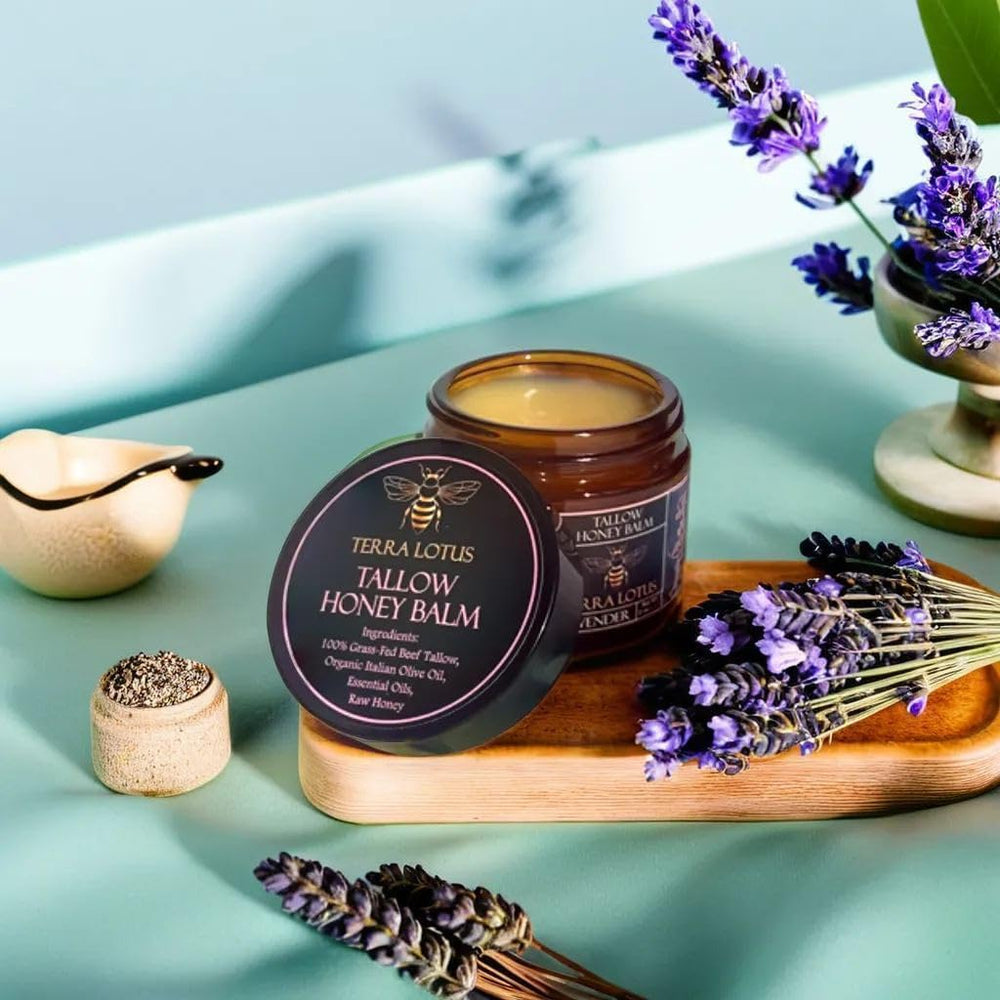 Small-batch Terra Lotus balm applied to hands and feet for balanced hydration.