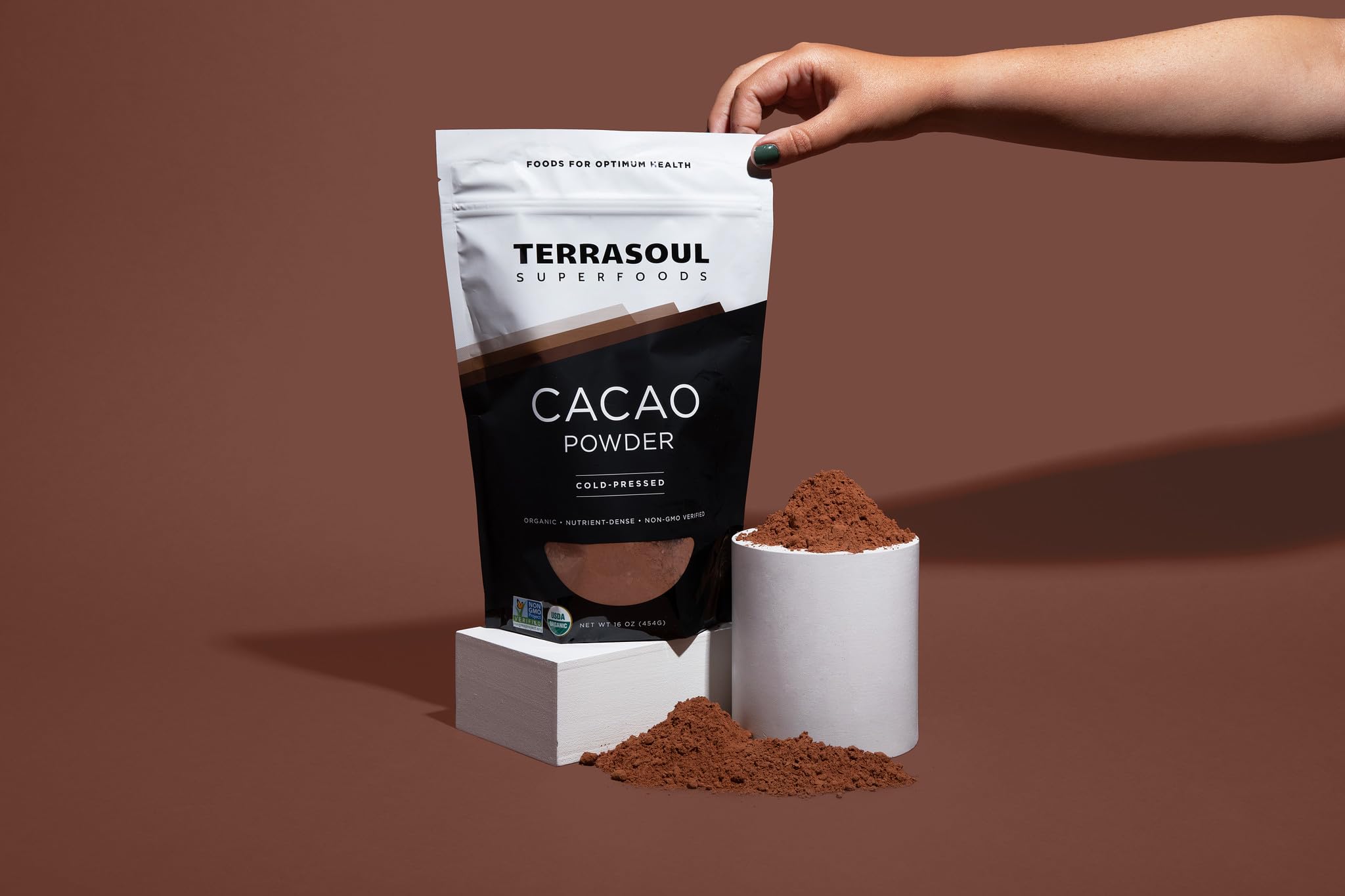 Terrasoul cacao powder 1lb pouch on kitchen counter.