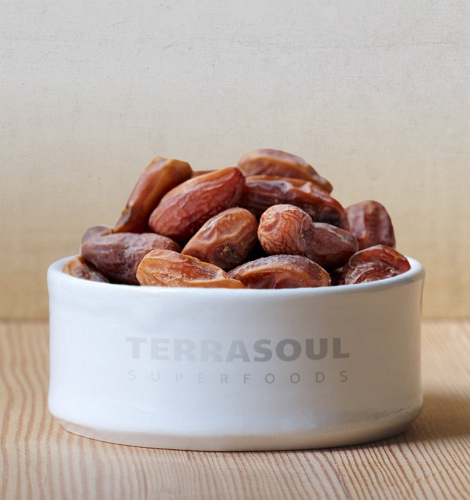 Terrasoul dates served on a snack plate for quick energy.