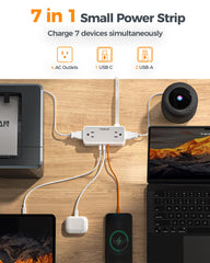 TESSAN 7-in-1 power strip with four outlets and USB ports for multi-device charging.
