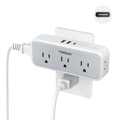 TESSAN multi plug outlet extender on a wall, space-saving for a compact home office