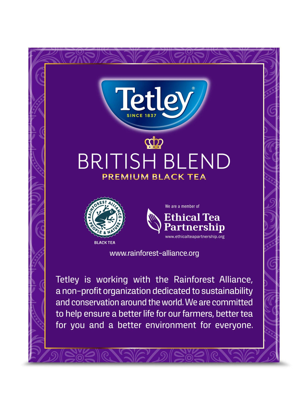 Pouring Tetley British Blend tea with visible steam and aroma.