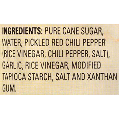 Thai Kitchen Sweet Red Chili Sauce label closeup emphasizing fresh peppers and garlic