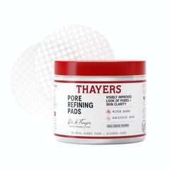 Thayers Pore Refining Pads bottle pour, alcohol-free formula for refreshed skin.
