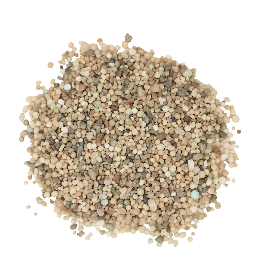 The Andersons premium crabgrass preventer granules close-up showing Dimension active ingredient in action.