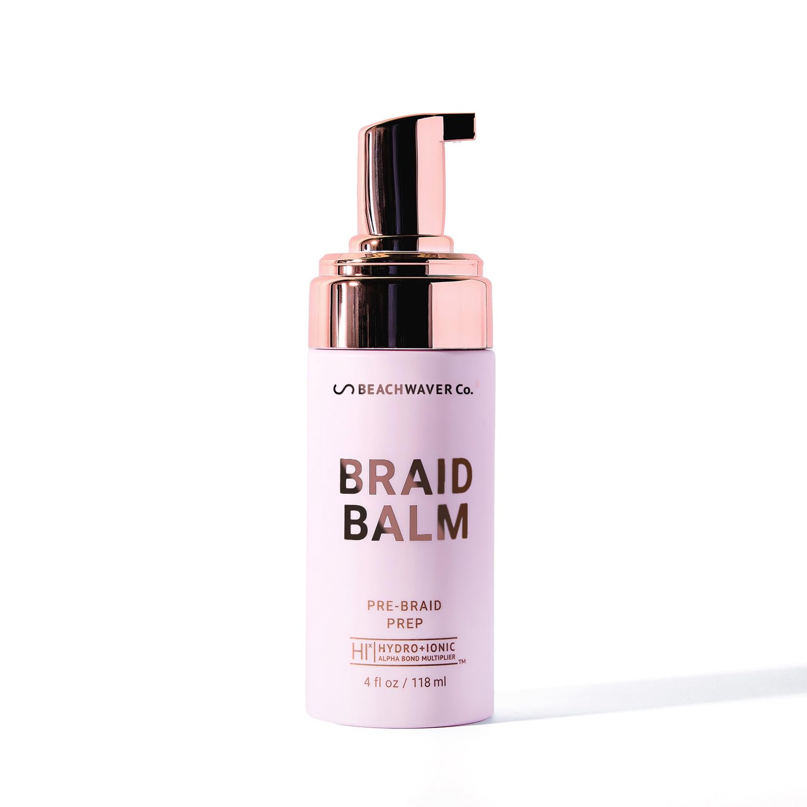 The Beachwaver Co Braid Balm Foam bottle ready for priming smooth braids