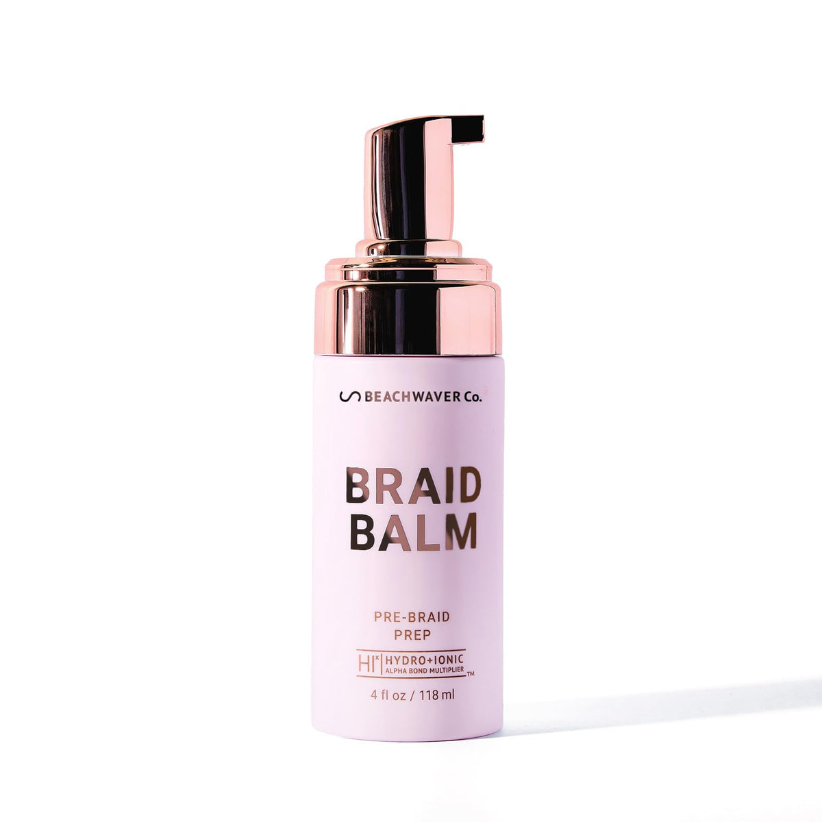 The Beachwaver Co Braid Balm Foam bottle ready for priming smooth braids