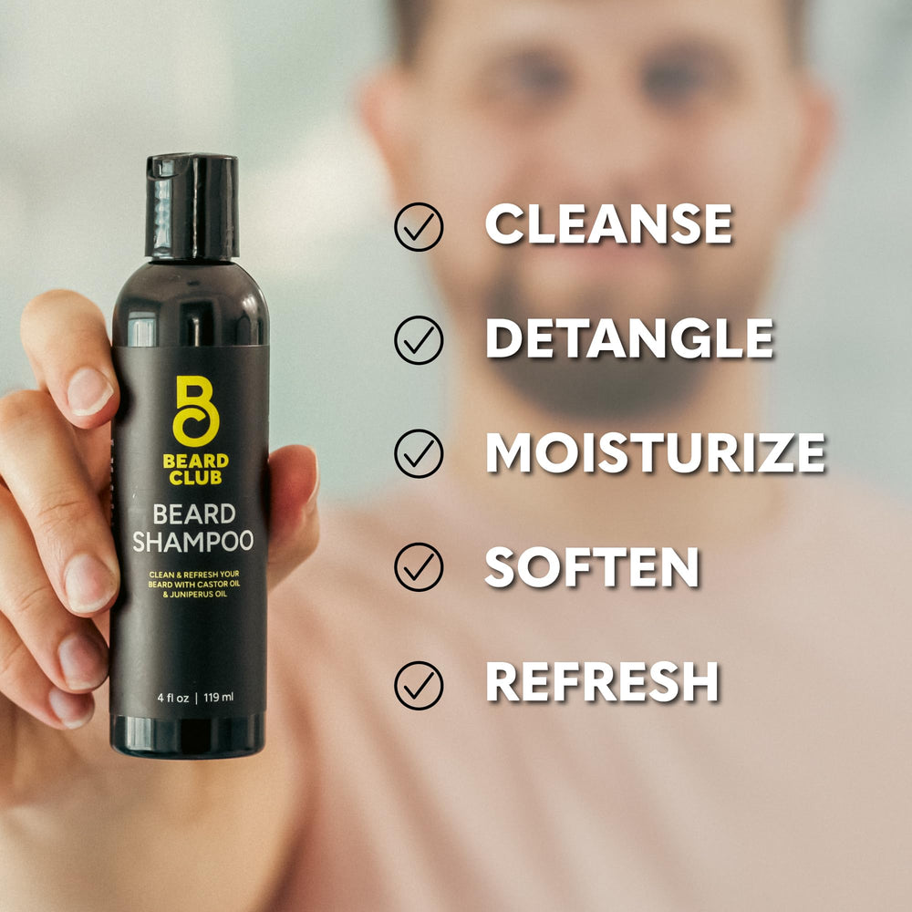 The Beard Club boar bristle brush distributes oil and smooths texture.