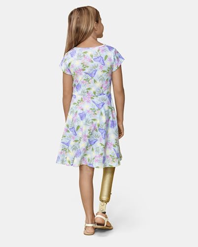 Butterfly Garden dress laid flat showing print and care label