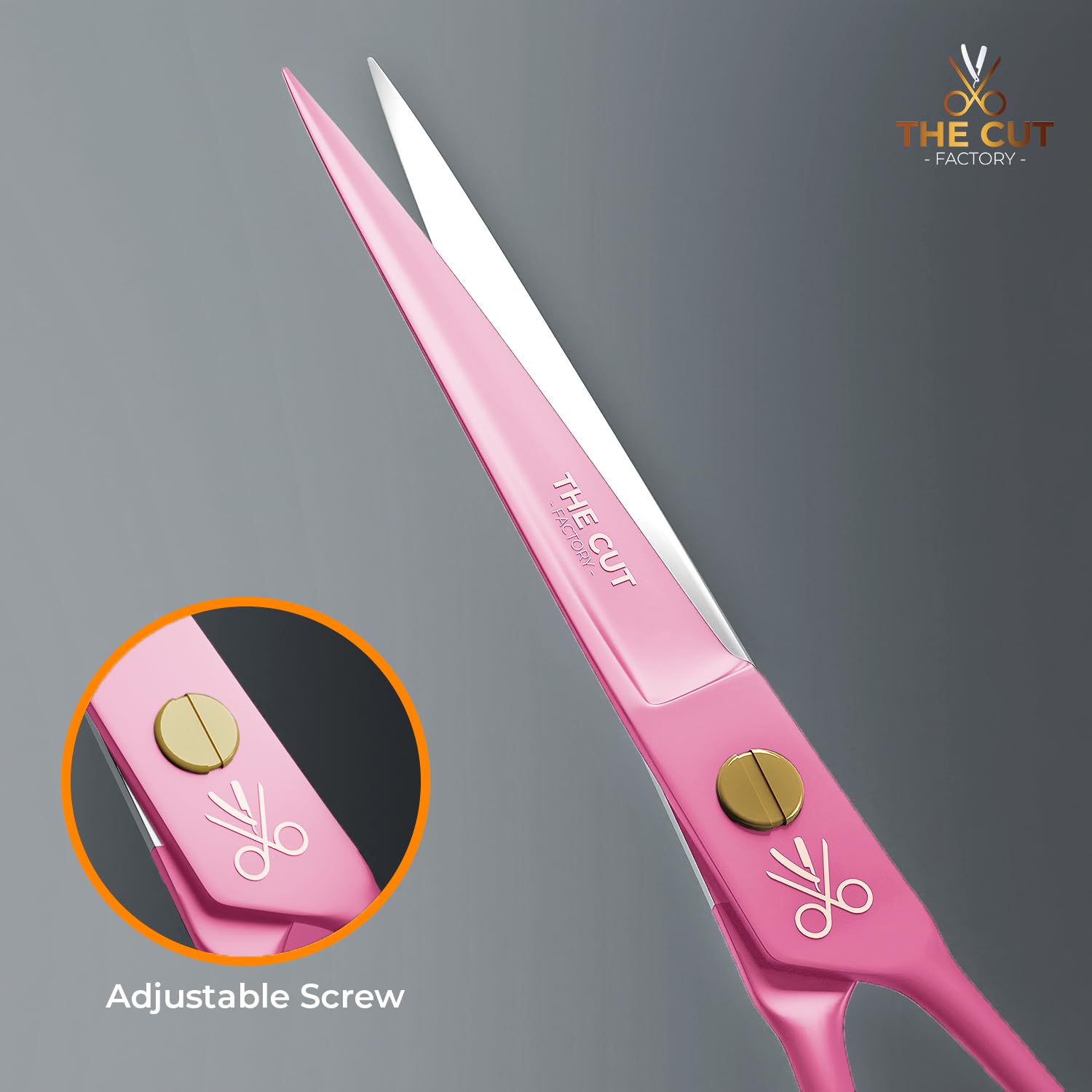 The Cut Factory pink barber shears in a modern salon setting for professional results