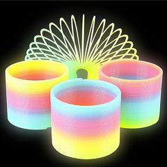 The Dreidel Company magic rainbow slingy glows softly for nighttime play.
