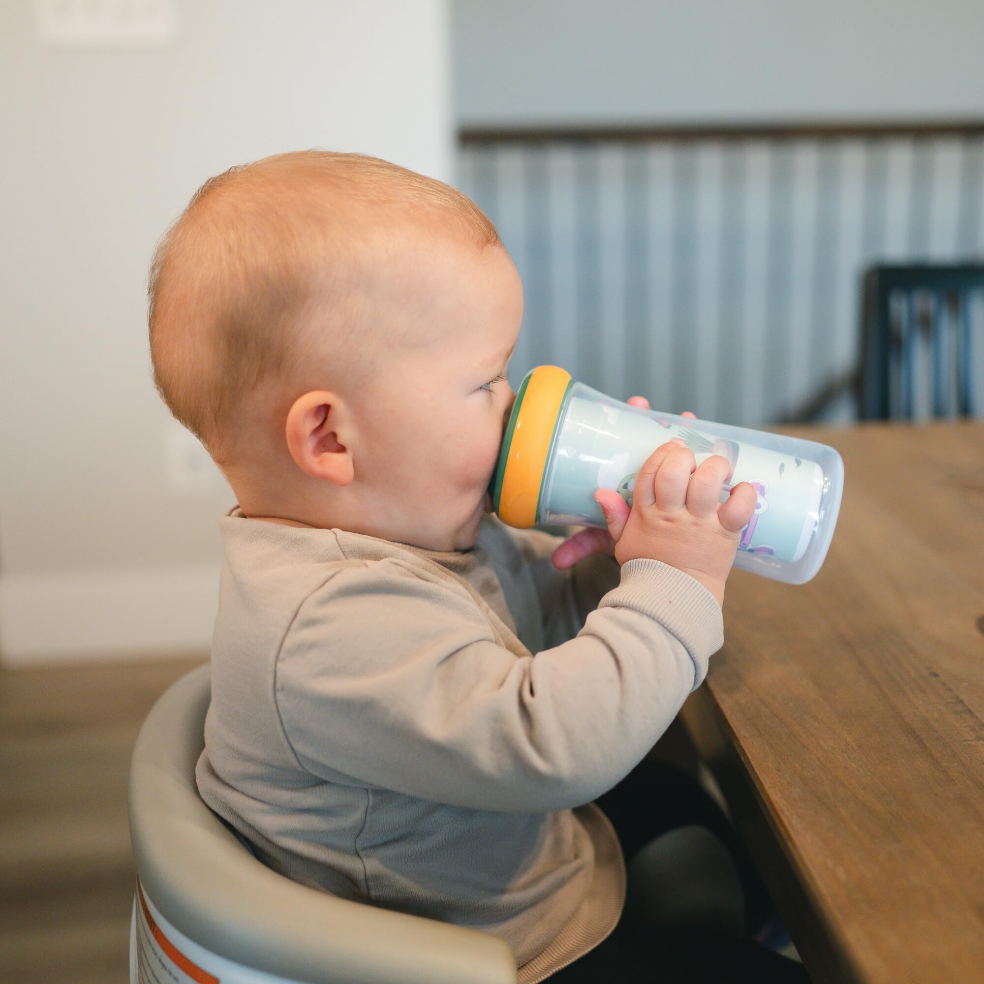 The First Years Bluey cup's bite-resistant spout protects developing teeth while sipping.