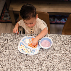 The First Years Bluey toddler fork designed for tiny fingers with easy grip.