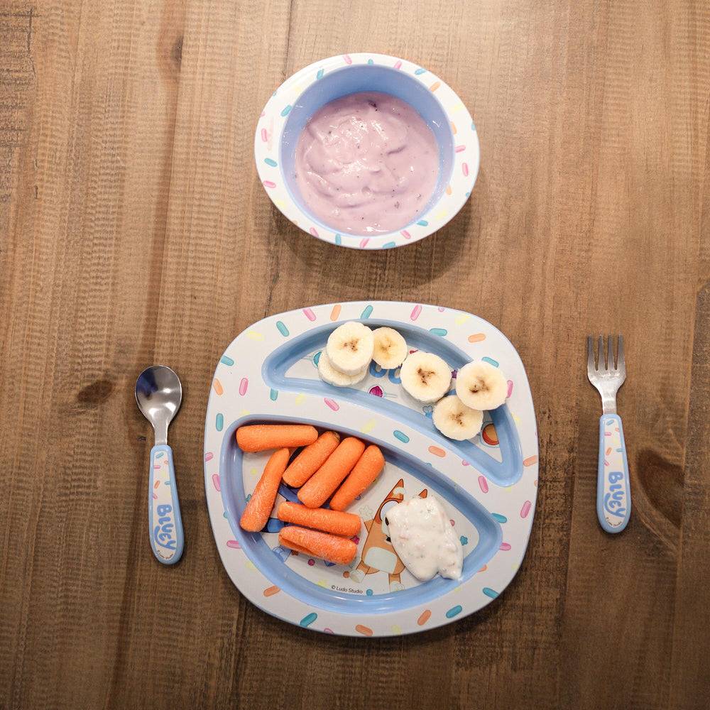 The First Years Bluey toddler spoon with sturdy handle for comfortable meals.
