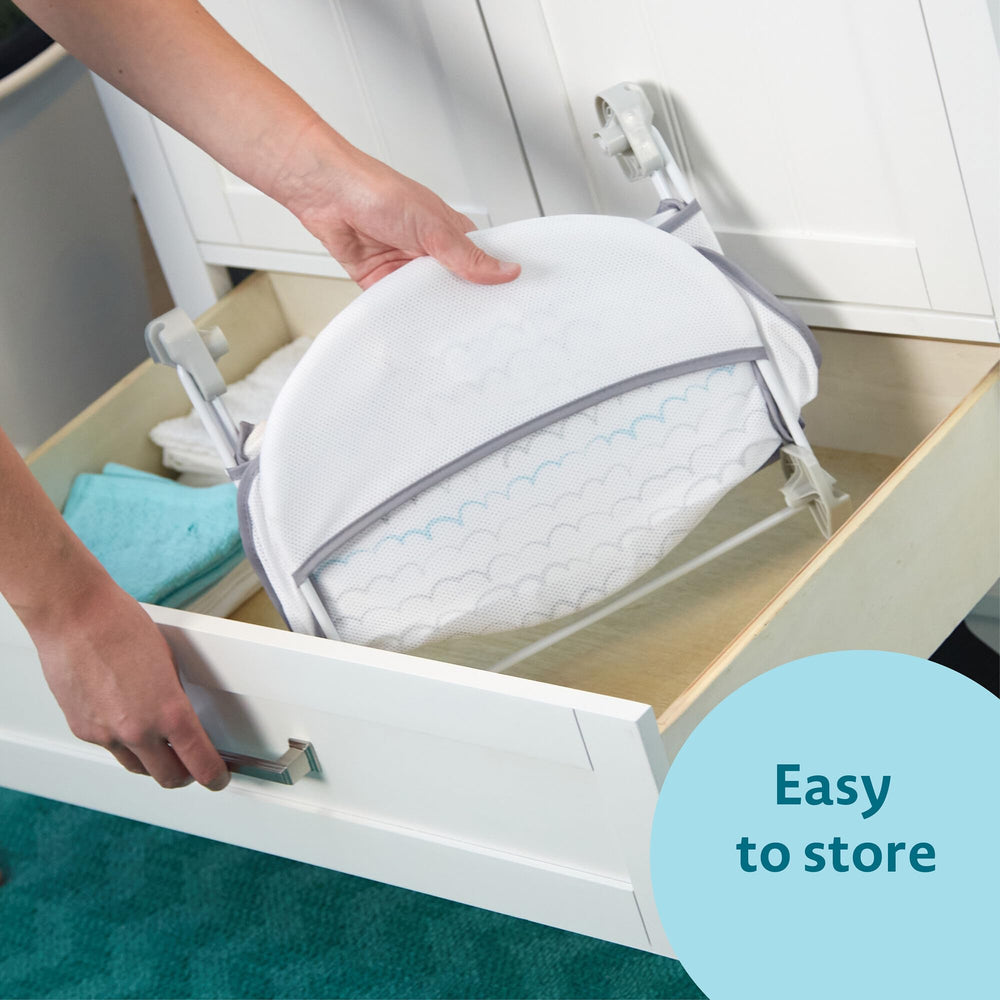 The First Years Sure Comfort bather supports bonding moments during bath time.