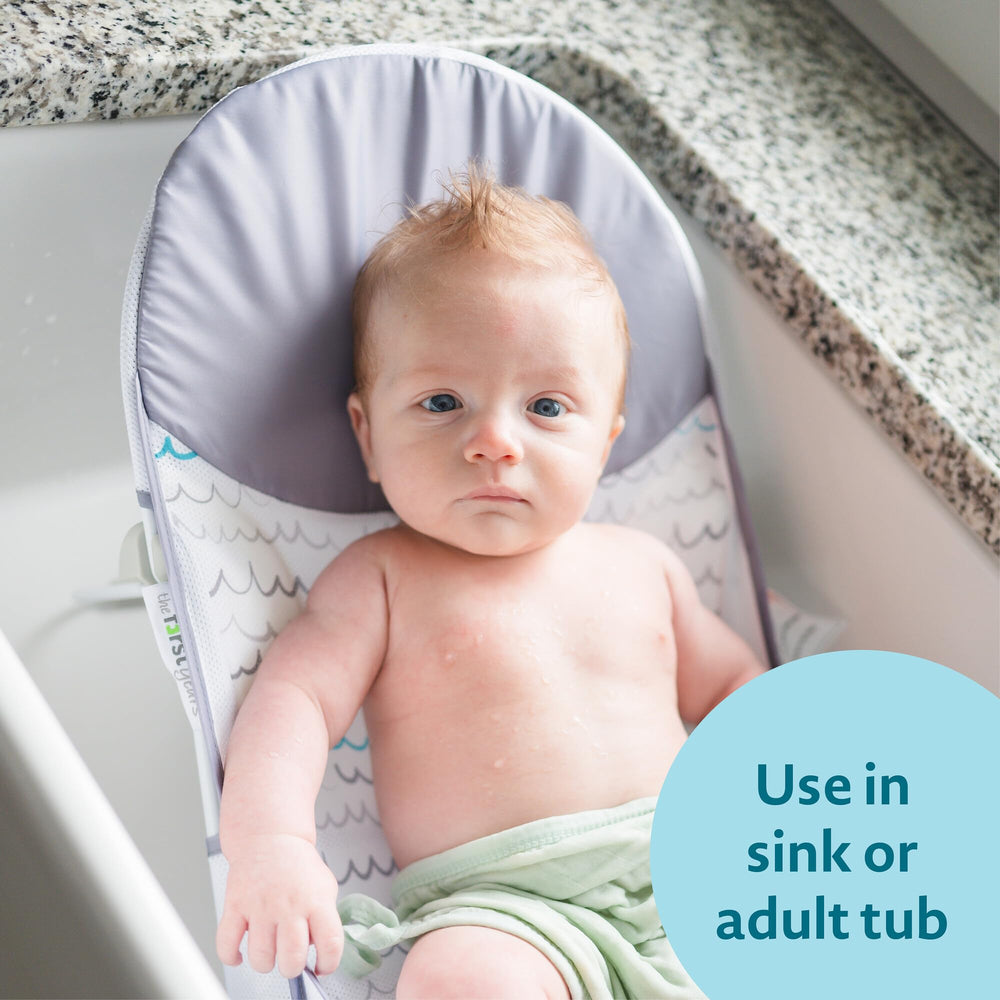 The First Years Sure Comfort folding bather folded flat for easy storage.