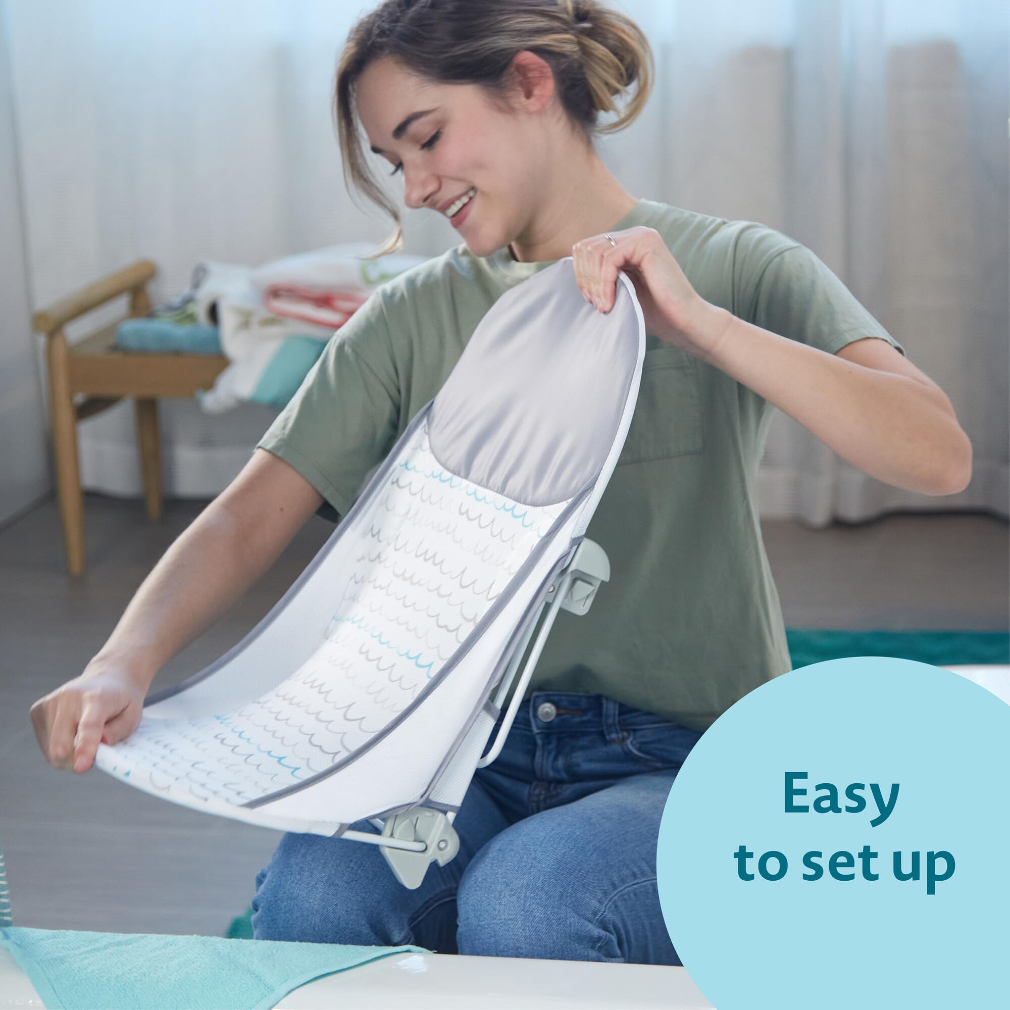 The First Years Sure Comfort folding bather travel-ready and lightweight for trips.