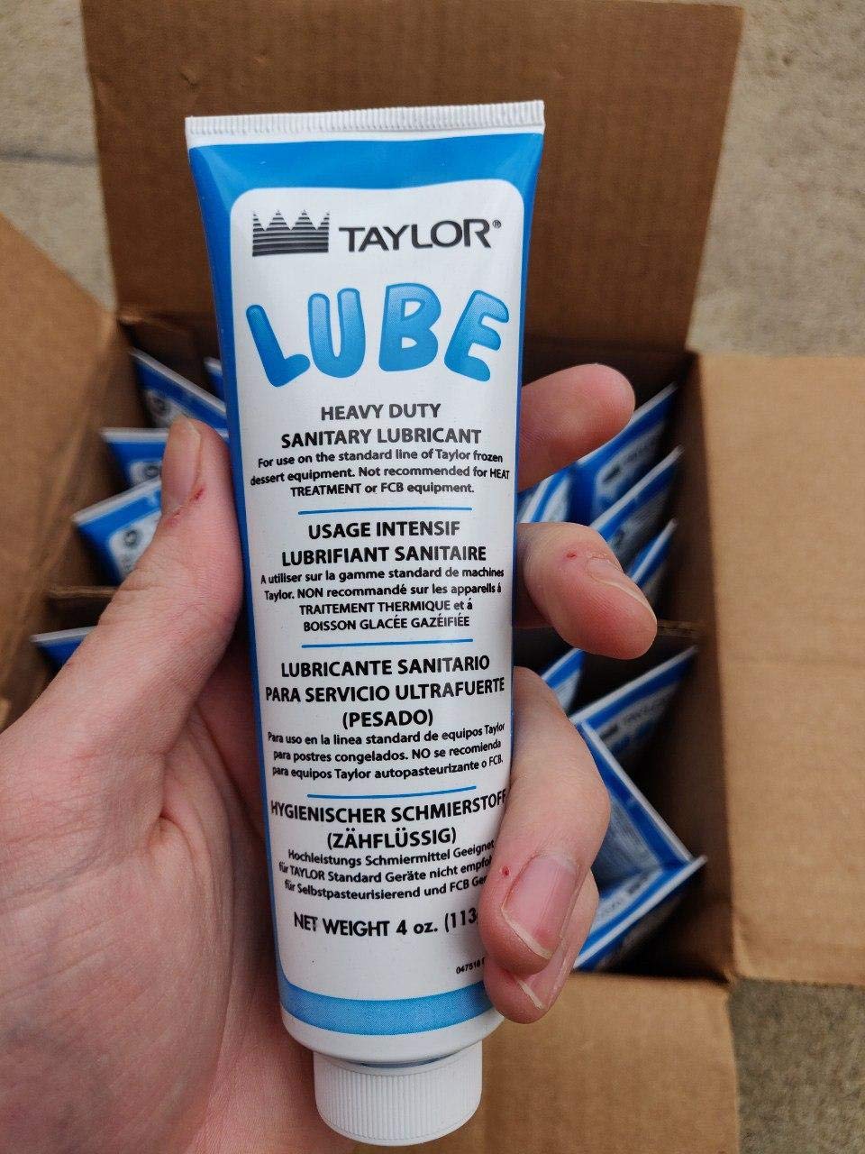 The Fryoilsaver Company Taylor Blue Lube Tube used with espresso and coffee equipment.