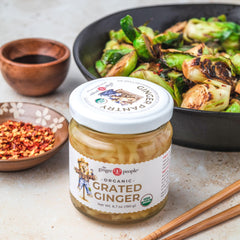 The Ginger People ginger grated organic brine bottle focuses on convenient, measured seasoning.