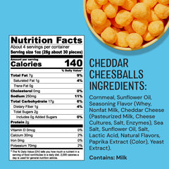 Close-up of cheddar cheese balls showing creamy center and crisp exterior.