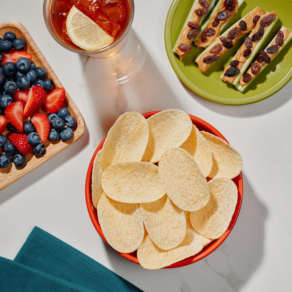 The Good Crisp Company Minis Sour Cream & Onion chips showcase savory flavor