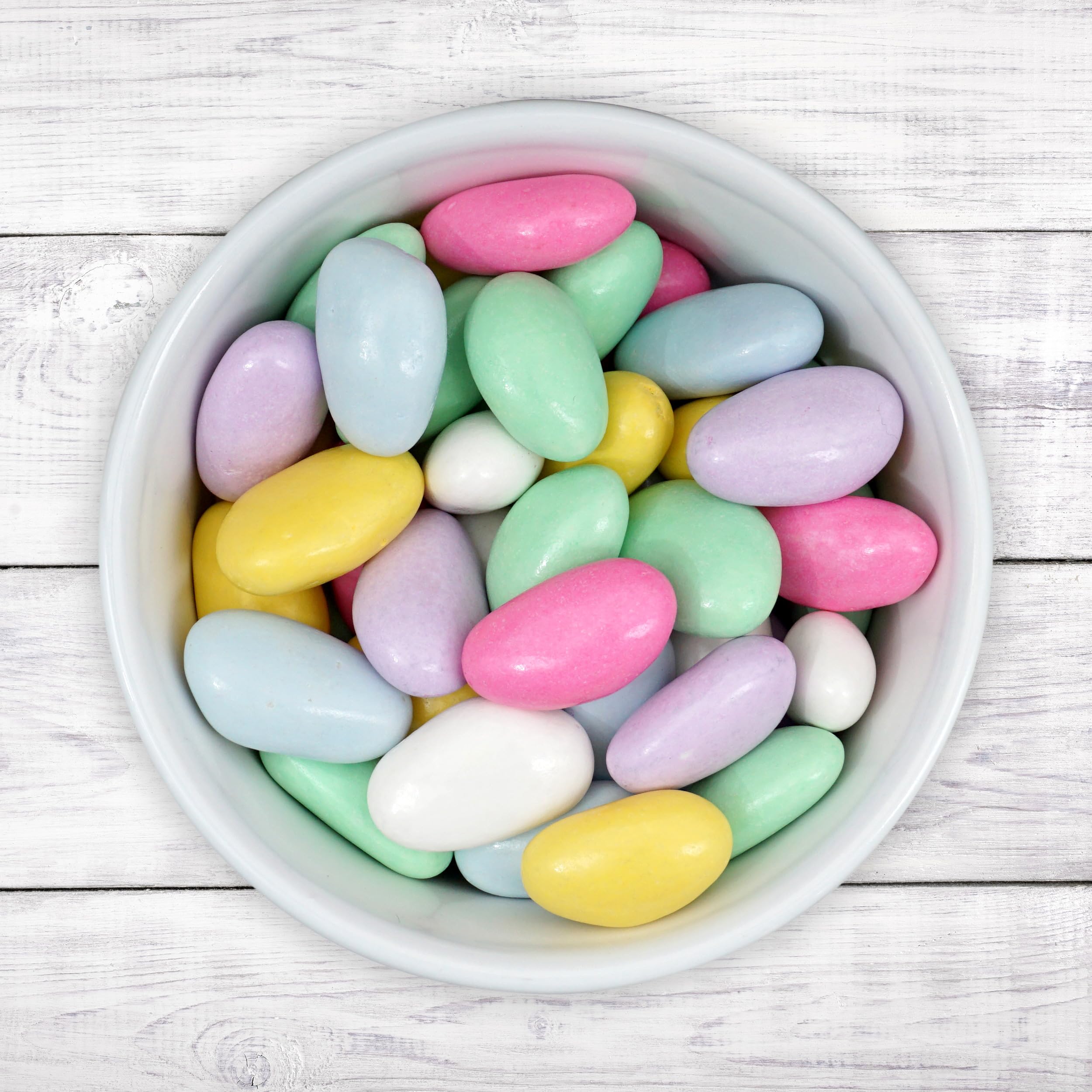The Hampton Candy Company display bowls filled with Jordan almonds brighten party tables