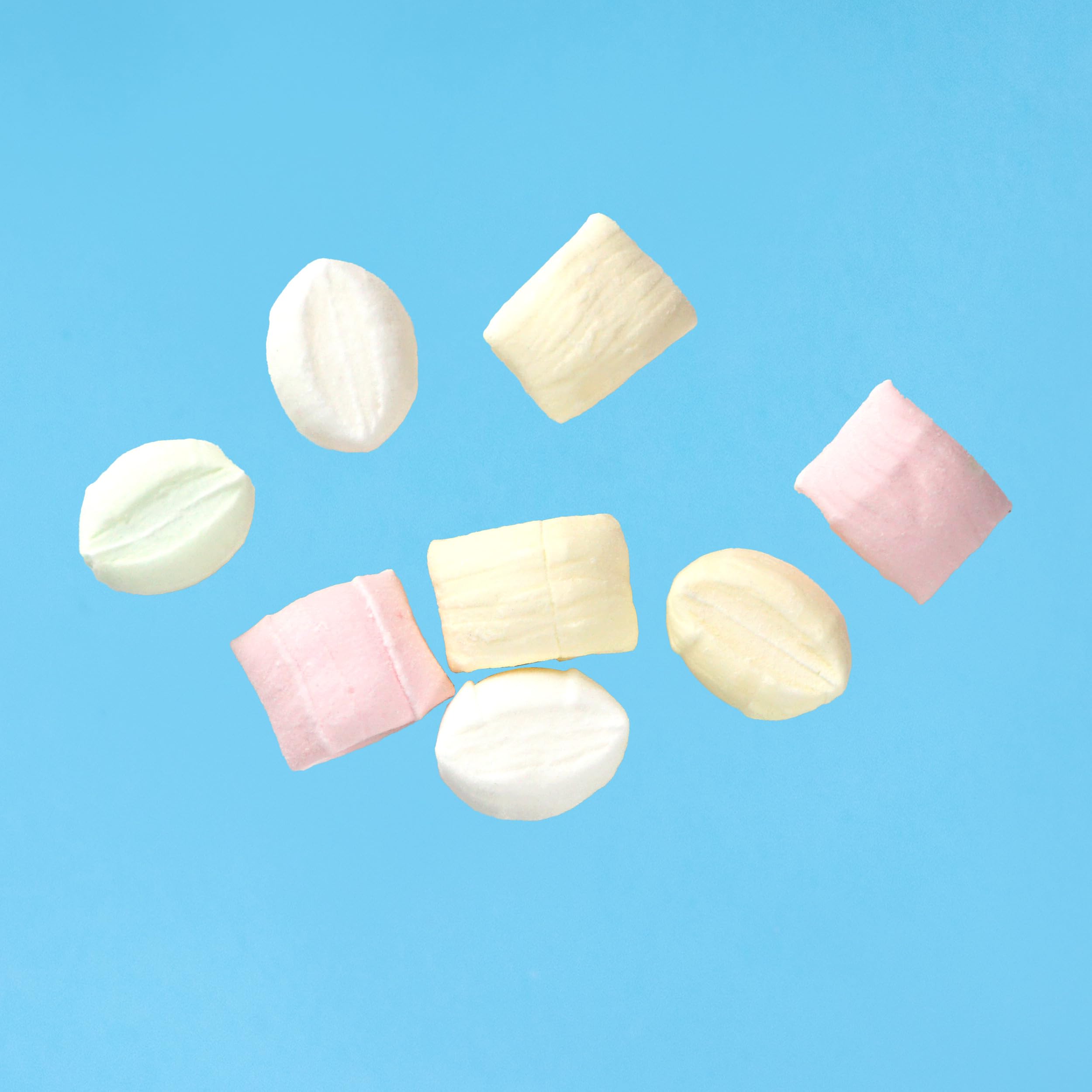 The Hampton Candy Company wedding reception mints arranged on a dessert table.
