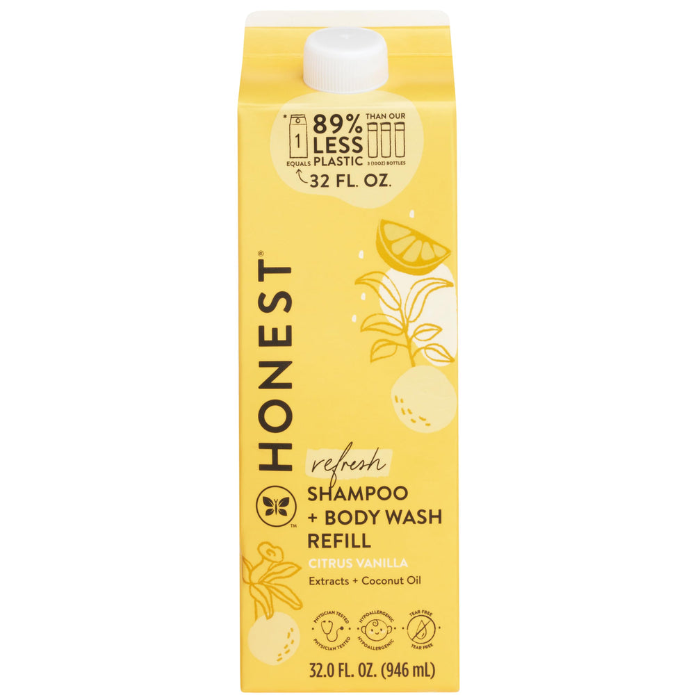 The Honest Company 2-in-1 Citrus Vanilla bottle pouring for gentle cleansing.