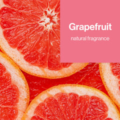 The Honest Company Grapefruit Grove wipes in hand for quick cleaning