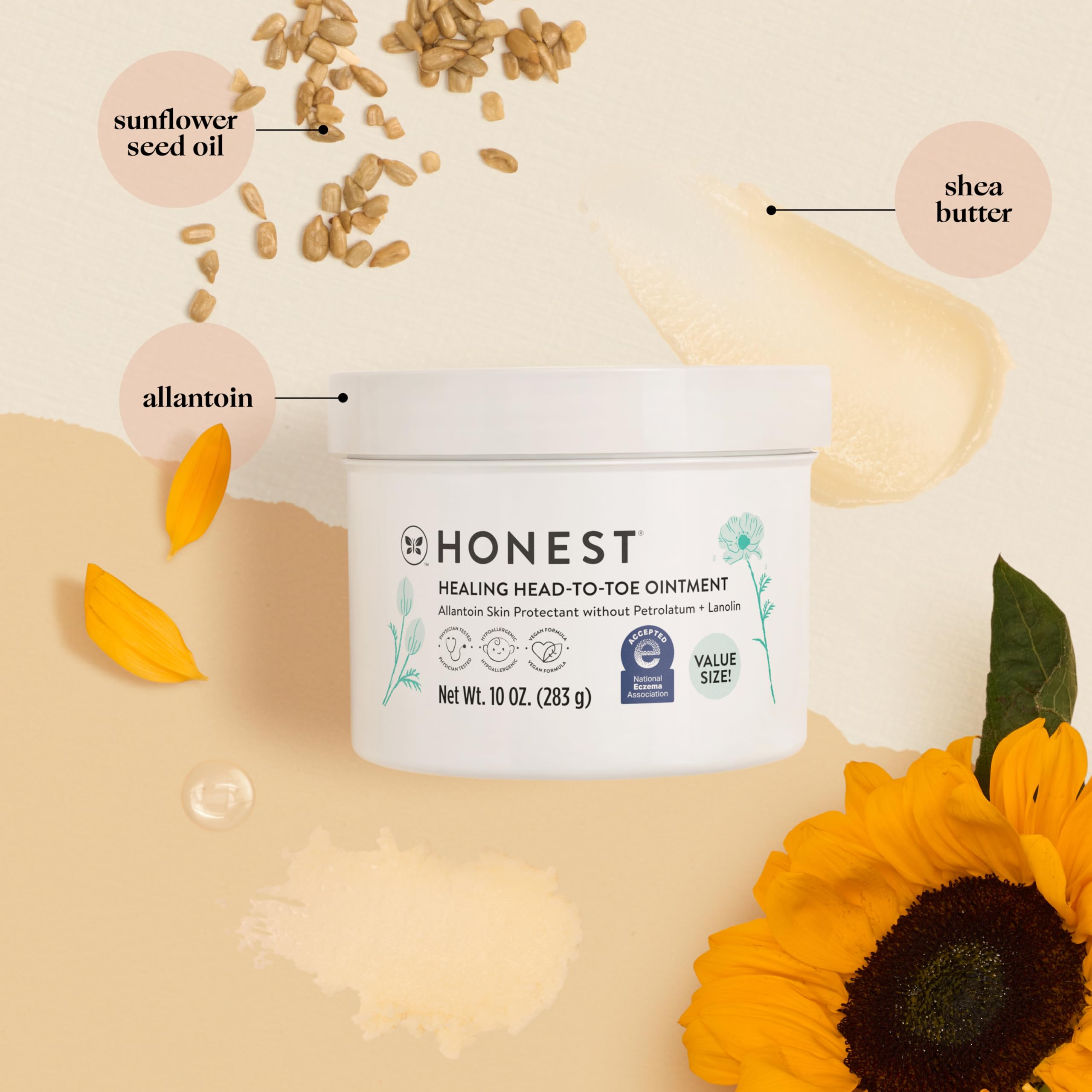 The Honest Company healing ointment texture closeup showing rich, creamy consistency for dry skin.