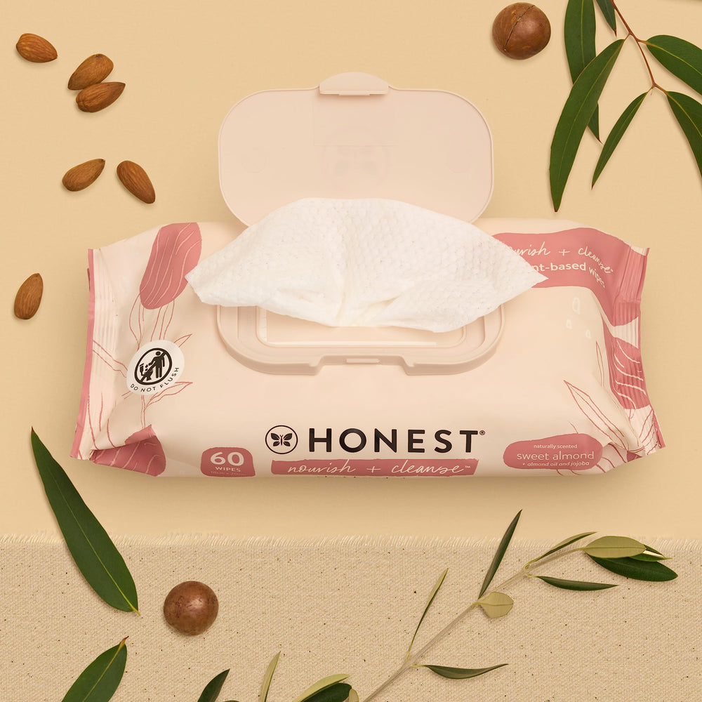 The Honest Company Nourish + Cleanse sweet almond wipes close-up showing thick, nourishing formula.
