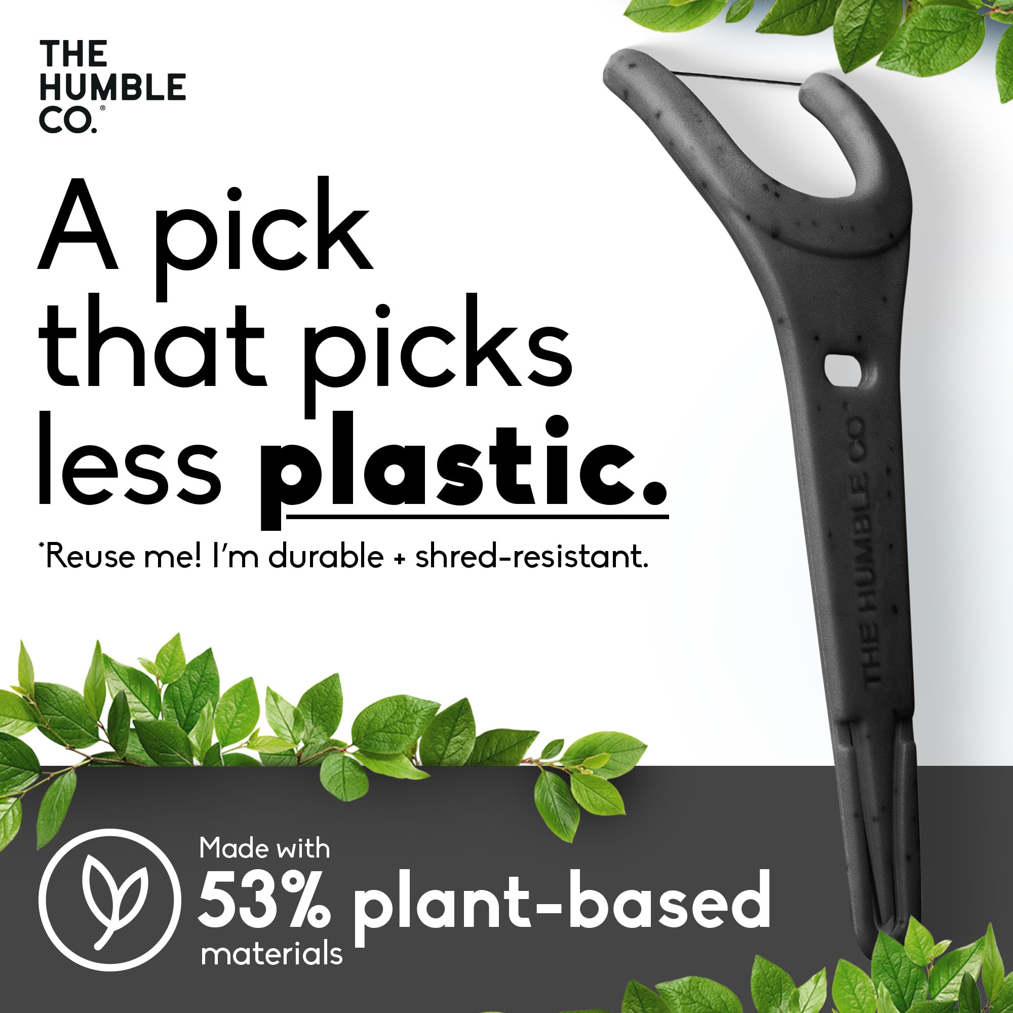 Charcoal Humble Co floss pick aiding interdental cleaning between teeth