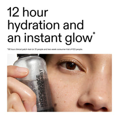 The INKEY List Hydro-Surge Dewy Mist atomizer close-up releasing a fine mist