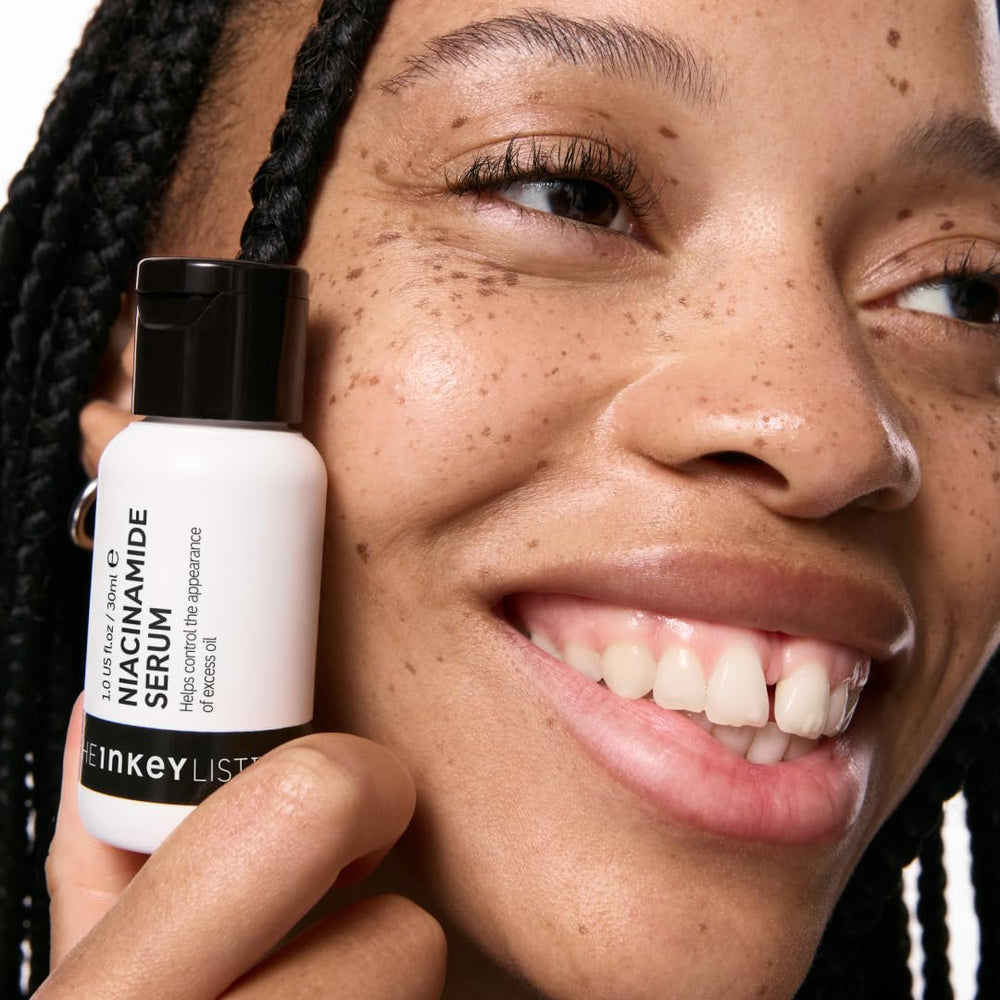 The INKEY List Niacinamide serum on a countertop display