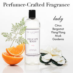 The Laundress Delicate Wash measuring cup demo shows precise dosing for 31 loads.