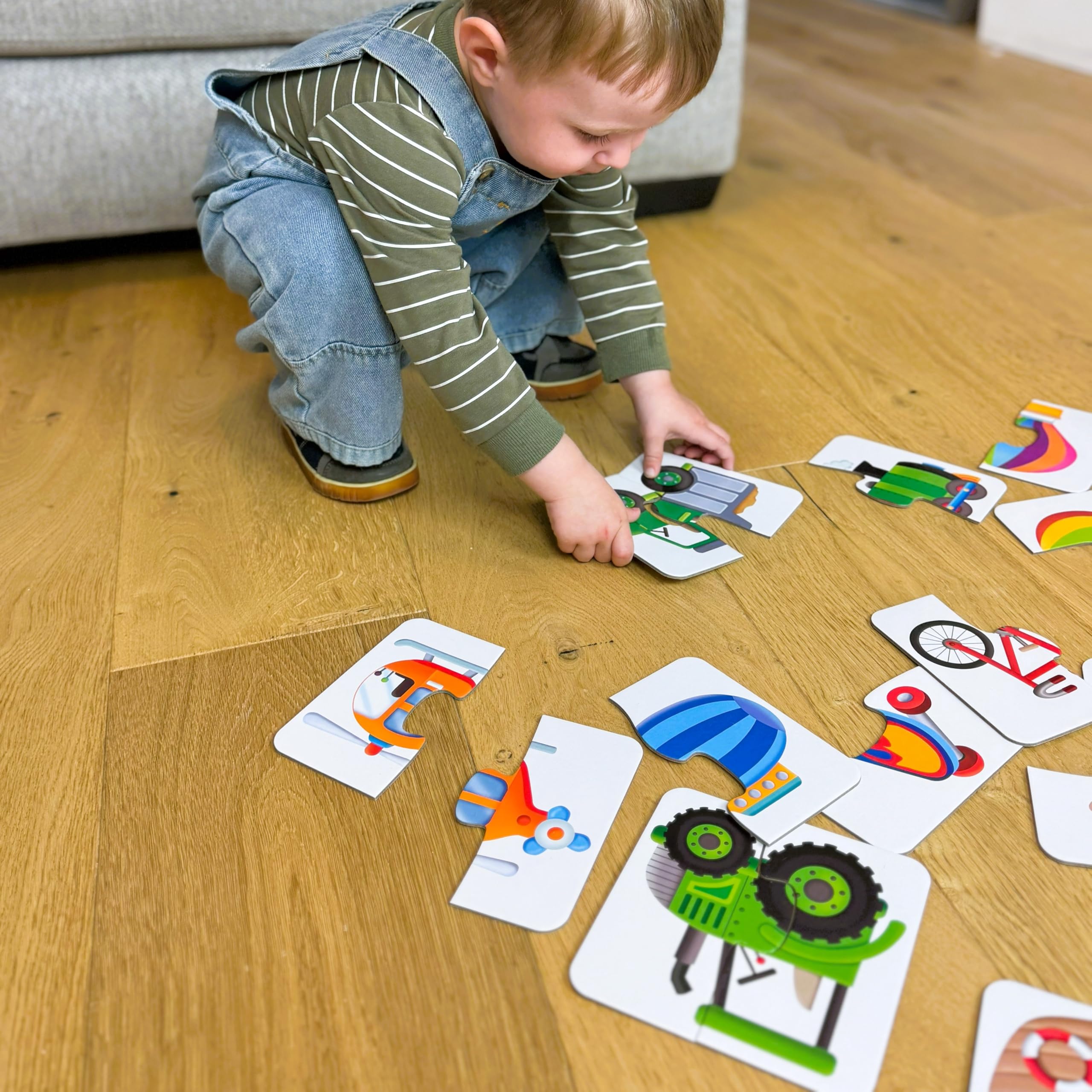 The Learning Journey puzzle card set completes a colorful transport scene with each correct fit.