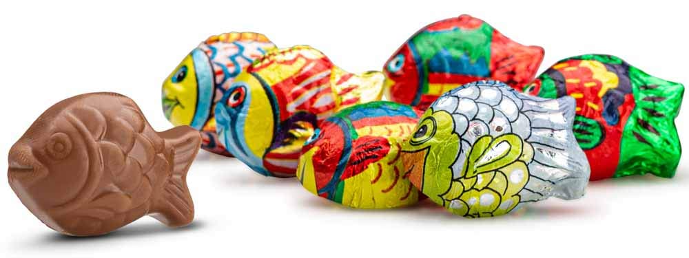Stack of Madelaine milk chocolate mini fish, compact 1.5 inch size